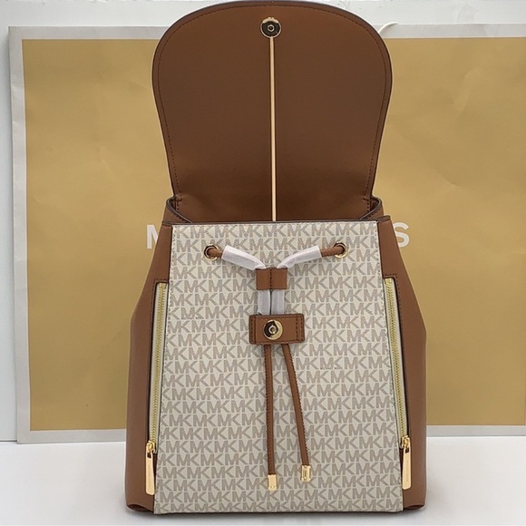 Michael Kors Phoebe 35F2G8PB2B Flap Drawstring Backpack 
Vanilla Signature 
NWT - Picture 10 of 16